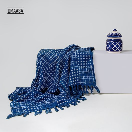 Sofa throw with stylish tassels by DMAASA for elegant home decor