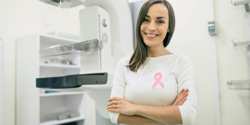 young-woman-hospital-with-pink-ribbon-breast-cancer-awareness-month-symbol_